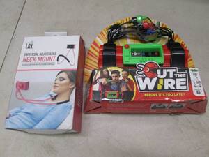 lot 284 image: cut the wire game, and phone neck m...