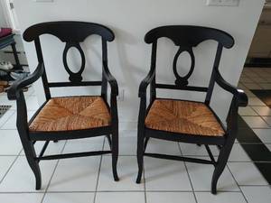 Two Black and Woven Chairs
