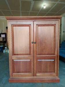 lot 129 image: Entertainment Center