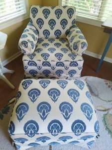lot 6 image: Blue and Cream Colored Upholstered Chair with Ottoman