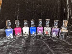 lot 217 image: Nailed it 8 Bottles Sally Hansen Disneys Crullela Gel Nail Polish plus top coat