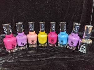lot 218 image: Its Electric 8 Bottles of Sally Hansen NEON Gel Nail Polish plus a bottle of top coat