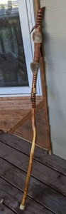lot 372 image: Amazing Walking Stick Wrapped in Leather with Beautiful Carvings Throughout