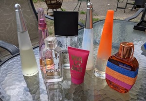 lot 94 image: Mixed Lot of Perfumes & Lotions Issey Miyake, Viva La Juicy, Intense, Hang Ten,  & More