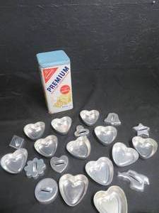 lot 30 image: ANTIQUE 1969 SALTINE CRACKER TIN, AND COOKIE CUTTERS