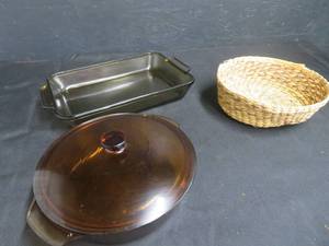lot 31 image: ANCHOR HOCKING DISH AND LID, GLASS CAKE PAN, PLUS WOVEN BASKET