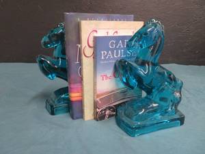 lot 42 image: 2 BLUE-GLASS HORSE BOOK HOLDERS- 3 BOOKS