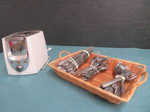lot 46 image: WOVEN BASKET, SILVERWARE SET (FORKS- SPOONS- KNIVES) TOASTER- BUN PAN  EXTRA PAN