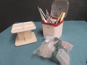 lot 49 image: LOT OF KITCHEN UTENSILS- A SEASONING HOLDER THAT SPINS- SOME TUPPERWEAR CONTAINERS