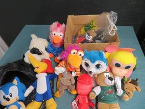 lot 81 image: HUGE LOT OF STUFFED ANIMALS- BEANY BABIES- MCDONALDS TOYS ALL WITH TAGS OR STILL IN BAGS