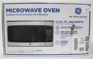 lot 536 image: GE - 1.1 Cu. Ft. Mid-Size Microwave - Stainless Steel