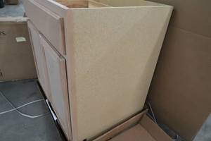 lot 561 image: Hampton Bay Hampton Unfinished Beech Raised Panel Stock Assembled Base Kitchen Cabinet (30 in. x 34.5 in. x 24 in.) KB30-UFDF
