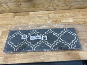 lot 40 image: OTTOMANSON Ottohome Collection Gray 9 in. x 26 in. Polypropylene Stair Treads (Set of 7)