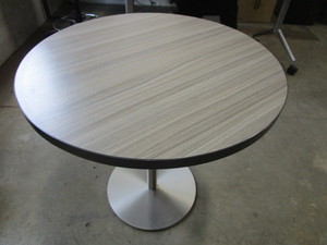 lot 115 image: WCI ROUND LAMINATE TOP TABLE