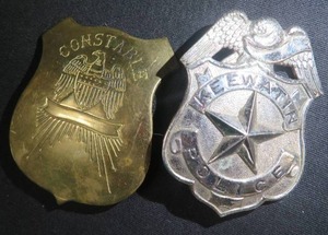 lot 20 image: ANTIQUE BRASS CONSTABLE BADGE. KEEWATIN POLICE BADGE