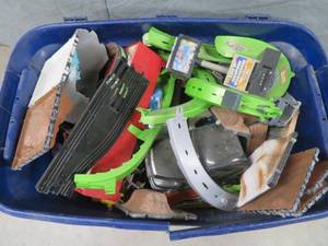 lot 44 image: LARGE BLACK BIN FULL OF VINTAGE TOYS AND ACTION FIGURES.