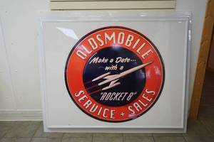 lot 71 image: Oldsmobile sign
