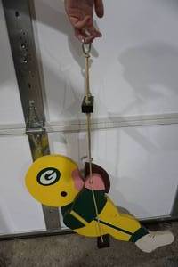 lot 90 image: Yard art GB packers