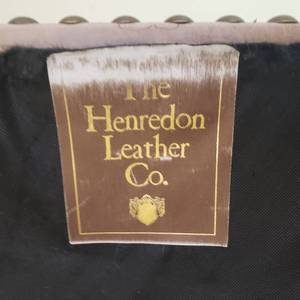lot 10 image: Henredon Leather Studded  Club Chair and Ottoman