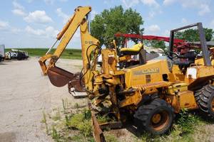 lot 7 image: Case Model 660 4 x 4 Trencher With Back Hoe Attachment