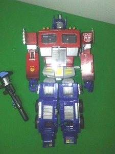 Transformer with weapon 11 inch tall.