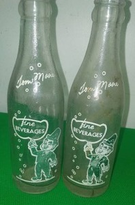 2 Tom Moore bottles Leprechaun.