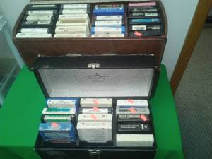 (35)  8 track trac tapes & storage cases.