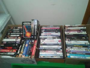 (34) DVDs & more.  VHS tapes.