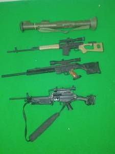 G.I Joe 12 (4) weapons and guns.