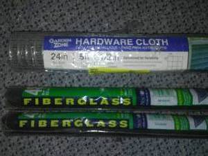 Fiberglass screen and wire fence.