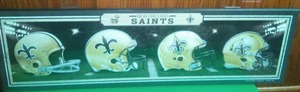 New Orleans Saints NFL Helmet sign. (30 x 9)