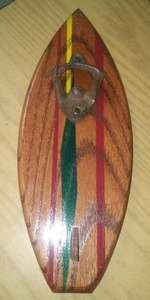 Vintage hook Bottle opener on surfboard.