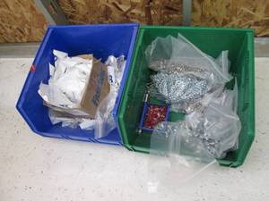 2 bins filled with nuts bolts washe...