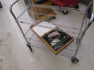 Metal cart on wheels with storage b...