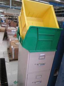 2 Large plastic bins and a 4 drawer...