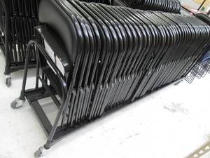 Rack of 43 folding chairs on wheels...