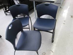 8 stacking plastic chairs with meta...