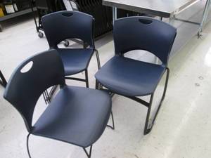 8 stacking plastic chairs with meta...
