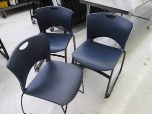 8 stacking plastic chairs with meta...