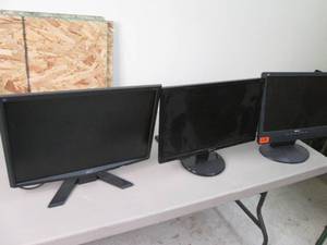 3 flat screen monitors...