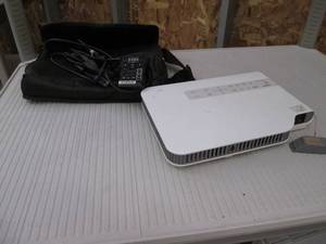 Casio projector in case...