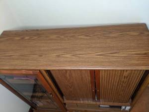 lot 369 image: Beautiful Wood Entertainment Center with Rolling Doors