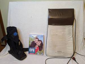 lot 341 image: Walking Boot, CPR training pack, Heated Back Massager