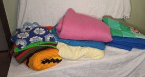 lot 306 image: Assortment of Blankets, Quilts, Crochet, Knit, Etc.