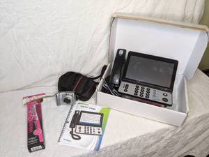 lot 319 image: Vintage Cannon PowerShot A540 and Ultratec CapTel 2400i and Accessories