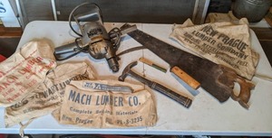 lot 102 image: Vintage Black & Decker 12 Electrical Utility Drill, Handsaw, Sickle, Workshop Aprons, & More
