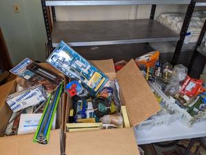 lot 487 image: Everything You See In the Containers and Boxes