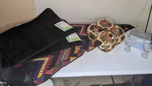 lot 555 image: South American Table Runner, (2) Luxury Bathmats (NWT), The Tuscany Collection Sunset Glass Candle Holders, Decorative Candle Holder