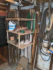 lot 93 image: All the Chains and Shop Shelving Contents