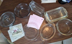 lot 380 image: Lot of glass cooking dishes and trivets